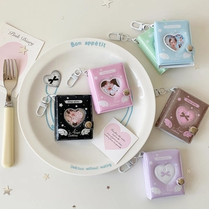 Mini album fotografici a forma di cuore in sei colori con portachiavi e motivi ad ala