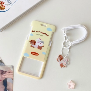 Detail of cute puppy card holder with slide cover, white spring rope and acrylic charm