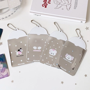 Detail of four transparent glitter card holders with cute cartoon dog and bear designs