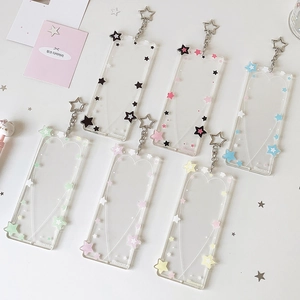 Six porte-cartes en acrylique colorés avec motifs d'étoiles et fermoirs métalliques