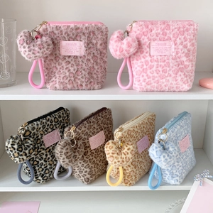 Winter plush leopard print cosmetic bags in assorted colors with heart charms