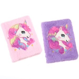 Pink and purple plush unicorn notebooks with soft faux fur covers and rainbow embroidery
