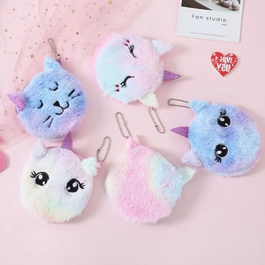 Close-up of fluffy gradient plush cat and unicorn coin purses with silver bead chains