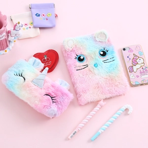 Rainbow plush notebook with cat ears and matching pencil case in soft pastel colors