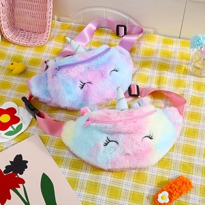 Detail view of plush unicorn waist bags with glitter horns and adjustable nylon straps