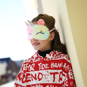 Cute colorful plush unicorn sleep mask with soft fur and embroidered closed eyes for girls