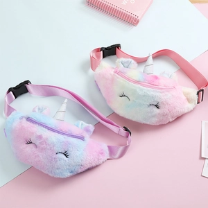 Close-up of soft plush unicorn waist bags in pastel gradients with silver horns