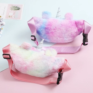 Detail of plush unicorn waist bags with colorful gradient fur and silver glitter horns