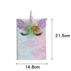 Detailed view of plush unicorn notebook showing soft colorful fur and 21.5cm height