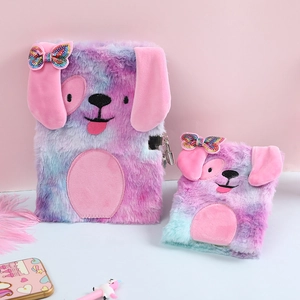 Detail of plush tie-dye puppy notebooks with locking mechanism and sequin bow accent