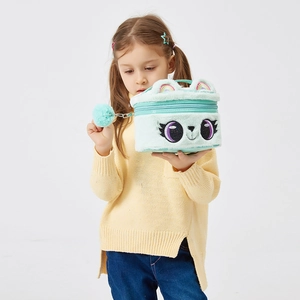 Detail of mint green plush cat makeup bag featuring rainbow ears and soft pompom charm