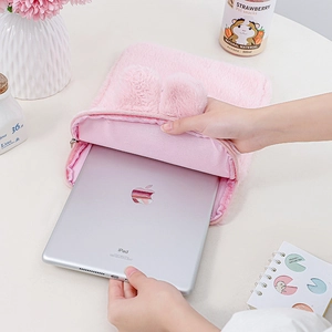 Pink plush bunny iPad sleeve detail showing soft texture and rabbit ear design
