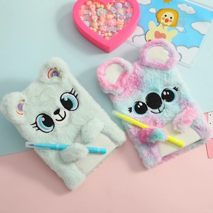 Close-up of cute plush koala and bear notebooks with 3D ears and colorful faux fur texture