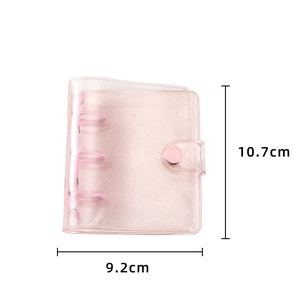 Detail view of pink glitter PVC 3-ring mini binder cover measuring 10.7cm by 9.2cm