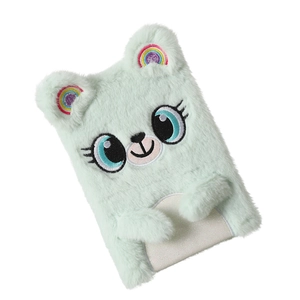 Detail of mint green plush koala notebook with rainbow ears and cute animal embroidery