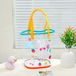 Transparent mesh tote bag with cartoon rabbit print and yellow handles for beach or travel