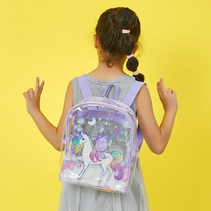 Transparent PVC unicorn backpack for girls with purple straps and Magic Dream print
