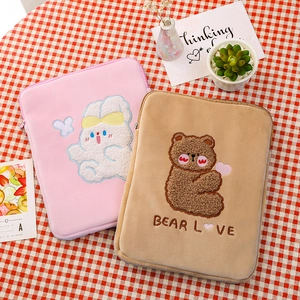 Cute cartoon rabbit and bear plush 11 inch iPad sleeve cases on a red checkered surface