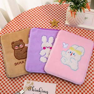 Detailed plush laptop sleeves in brown, purple and pink with cute animal embroidery