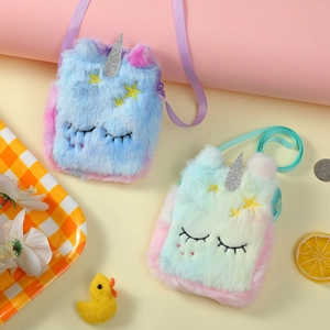 Detailed close-up of fluffy unicorn plush crossbody bags in blue-purple and pastel colors