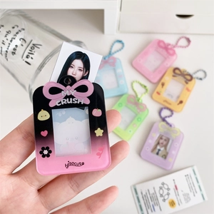 Acrylic photo card holder with colorful gradient bow and heart pattern on a beaded chain