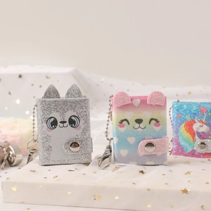 Three cute mini glitter loose-leaf notebooks with animal patterns and metal chains