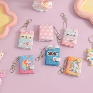 Mini sequin keychain wallets with cartoon patterns like unicorns and rainbow bears
