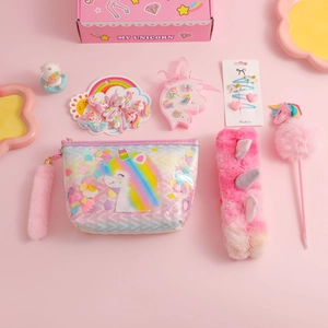 Pink plush unicorn notebook stationery gift set with hair accessories in a box