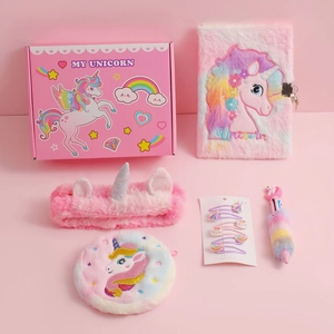 Unicorn plush notebook gift set with hair accessories and stationery in pink box