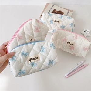 Quilted bow pencil case with butterfly pattern for school stationery storage