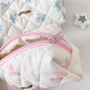 Quilted bow print pencil case with large capacity and soft fabric in cream finish