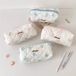 Quilted bow pencil case set in pink and blue fabric with zipper and hisocute label