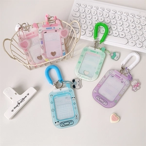 Smartphone shaped acrylic photocard holders in pastel colors with spiral spring keychains