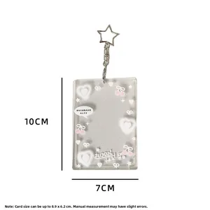 Détail du porte-carte pailleté avec fermoir étoile argentée et dimensions précises