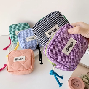 Five assorted quilted plaid coin purses with zipper tassels in vibrant colors for students