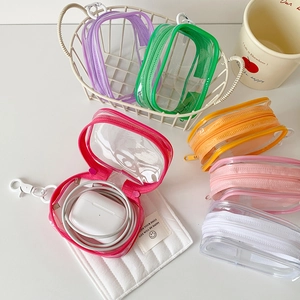 Multi-colored PVC clear organizer pouches for dolls and AirPods with hanging hooks