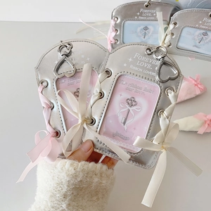Silver metallic photocard holder with pink ribbons and heart-shaped metal hook