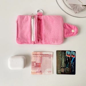 Pink plush coin purse with card slot, snap closure and carabiner for keys and earphones
