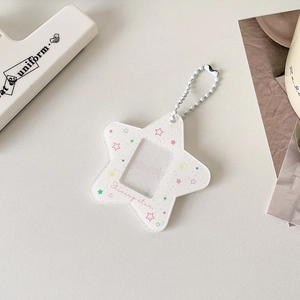 Porta tessere in acrilico glitterato a forma di stella con catenella a sfere bianca