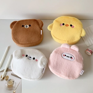 Flat lay of four cute cartoon animal plush pouches featuring bear, chicken, dog and rabbit