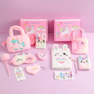 Pink plush unicorn stationery gift set with fluffy notebook, handbag, and accessories