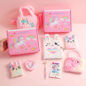 Plush unicorn themed girls stationery gift set with notebooks and furry handbags