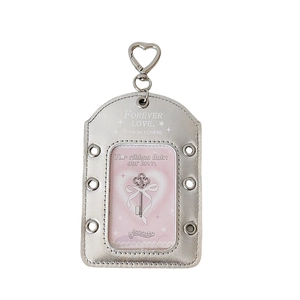 Silver metallic photo card holder with heart clasp and ribbon design for kpop photocards