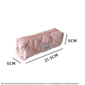 Pink quilted pencil case detail showing dimensions 21.5cm x 9cm x 5cm and soft fabric