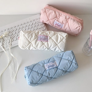 Quilted cream pencil case in pink, white, and blue with high-capacity storage for students