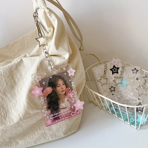 Porte-carte photo en acrylique rose pailleté en forme d'étoile sur un sac en toile