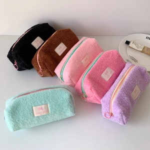 Large plush cosmetic bags and pencil cases in six assorted colors with metal ring zippers