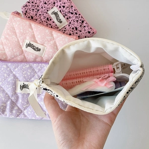 Portable square makeup bag set in ink splash and quilted patterns with metal zipper