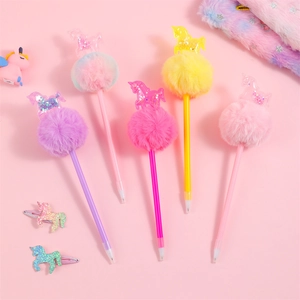 Detail of colorful unicorn pom pom pens with glitter unicorn toppers and soft fur balls
