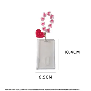 Clear card holder with pink heart bead wristlet showing 10.4x6.5cm dimensions